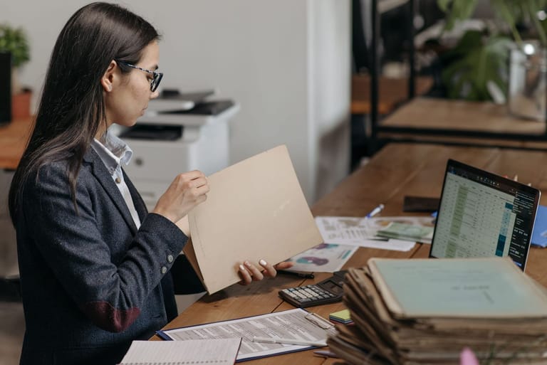 Model Maxalt Opt: paperwork spread across a desk